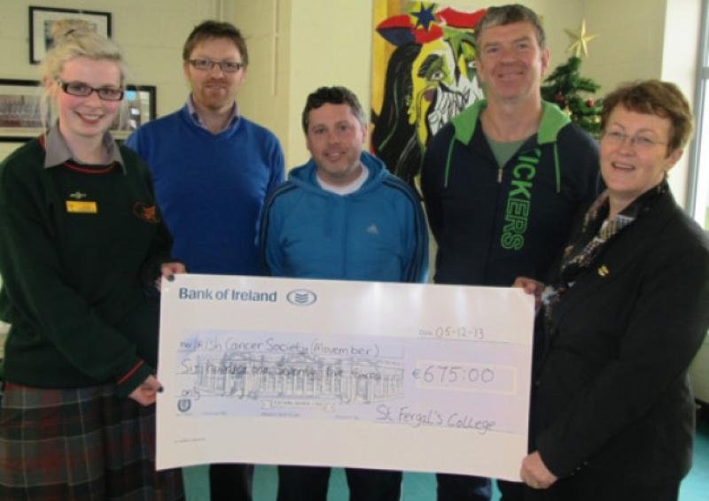 William Kiernan, Alan Fogarty and Pat Roe with Senior Prefect Noelle Powel and Aine O' Neill and the cheque for �675