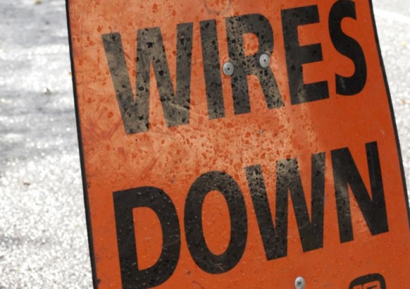 Motorist face delays in glencar on sunday morning as ESB Staff make repairs to a pole which was severely damaged. Photo David Mc Daid.