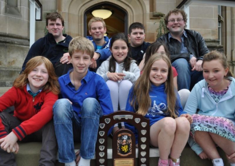 A group of Laois and Offaly musicians who competed at the All Ireland Fleadh in Derry, with their teachers James and Robert Harvey.