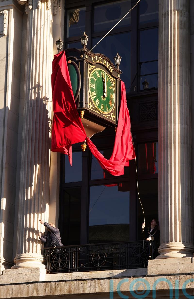 Dublin’s landmark Clerys clock ticks back into action