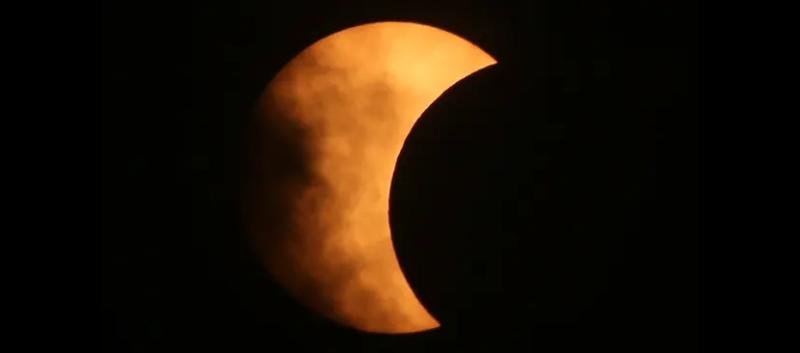 Watch 'the moon take a bite out of the sun' during partial solar eclipse