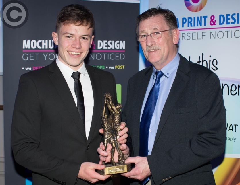 Minor Football Player of the Year Finbarr Crowley (Emo Courtwood The Rock) is presented with his award by Tom Jones. Picture: Alf Harvey/HRPhoto.ie