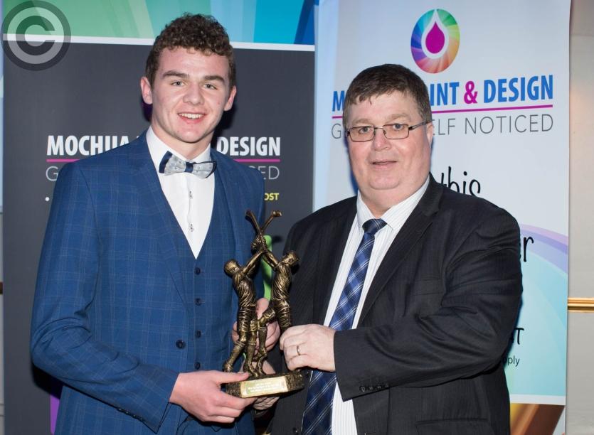 Minor Hurling Player of the Year Liam Delaney (Abbeyleix Gaels) is presented with his award by Paschal McEvoy. Picture: Alf Harvey/HRPhoto.ie
