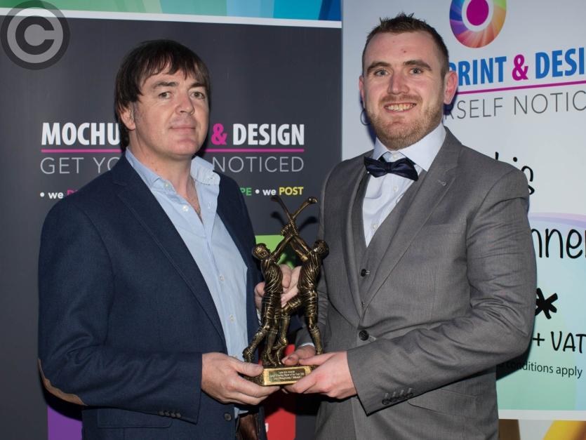 Junior B Hurling Player of the Year Tony O'Shaughnessy (Ballinakill) is presented with his award by Kieran Leavy. Picture: Alf Harvey/HRPhoto.ie