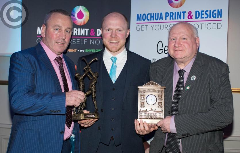 Senior Hurler of the Year Brian Stapleton (Borris in Ossory Kilcotton) is presented with his award by Sean Mortimer and also an award from John Hyland