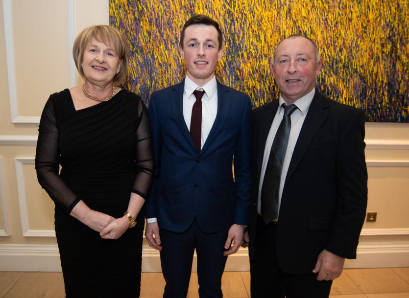 Dylan Cahill, Conor Brown and Sean O'Sullivan with the U-12 Hurling cup on Sunday. Photo Denis Byrne.